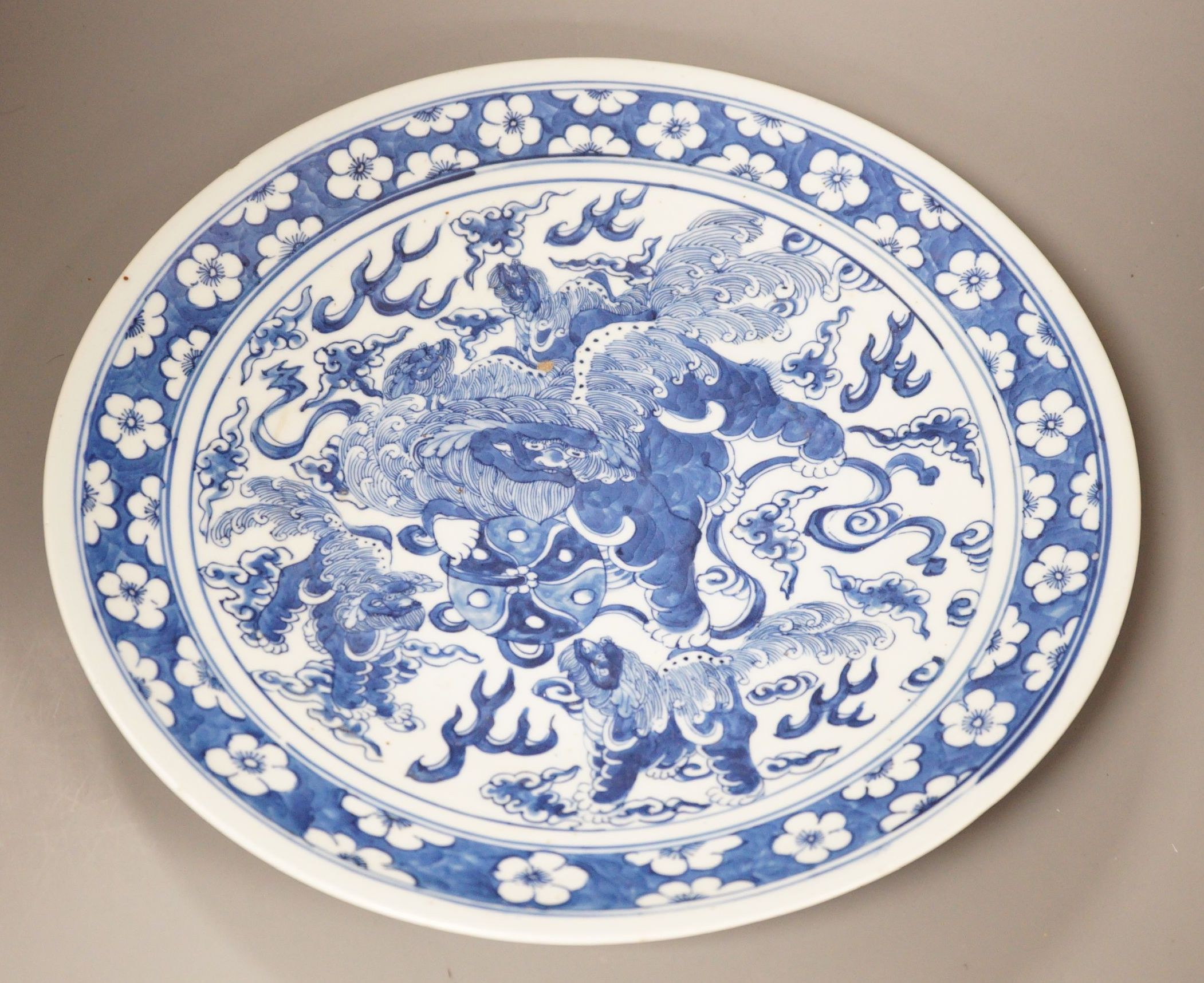 A 19th century Chinese blue and white 'Buddhist lion' dish, 35cm
